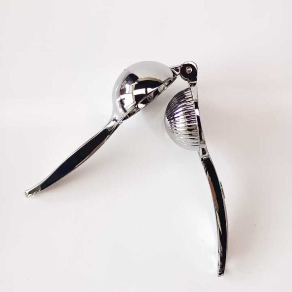 Hbc34c6b809d04bfbb7eb50d3042a80d1l.jpg_720x720q50.jpg Stainless Steel Lemon Juice Squeezer